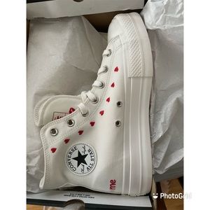Vintage white heart converse